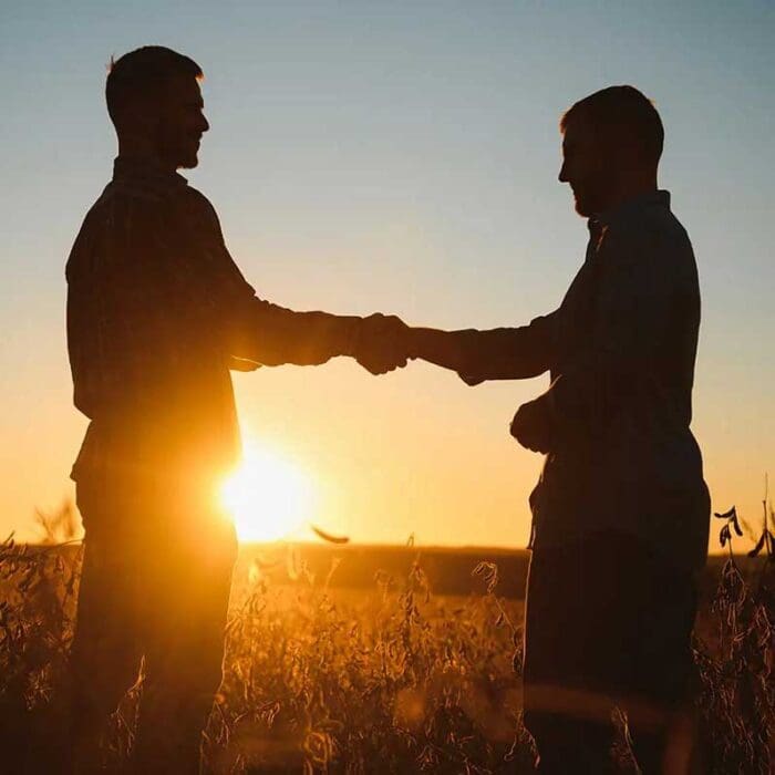 two-farmers-standing-in-a-field-examining-soybean-new.jpg